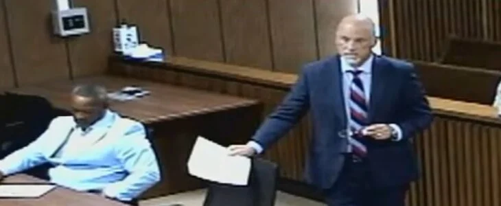 Bob Sombathy defending client in trial